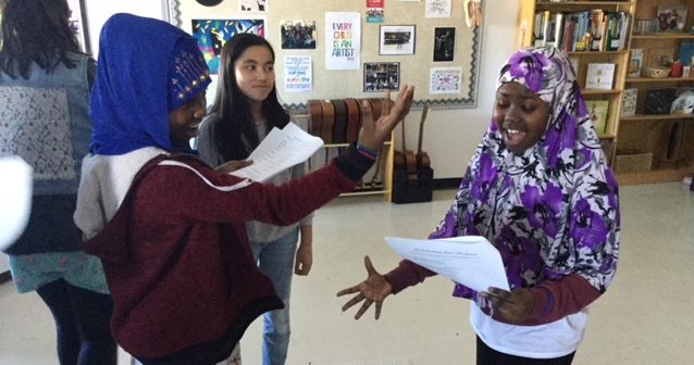 Students from Pinkham School participate in an Opera Trunk lesson.