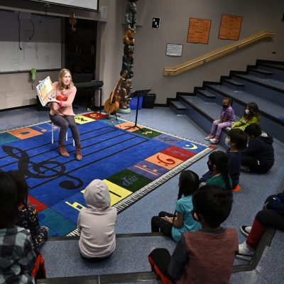Soprano Katherine Mayba reading <i>Opera Cat</i> to students at James Nisbet Community School as part of I Love to Read month.